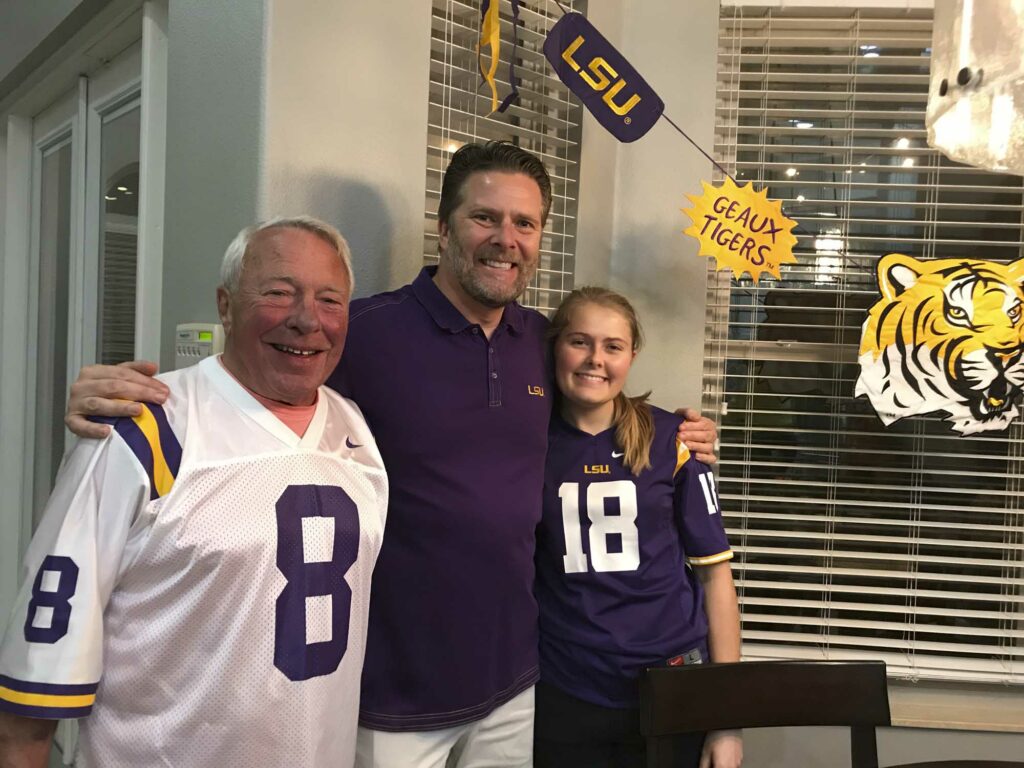 Dr. Collins and family in LSU gear