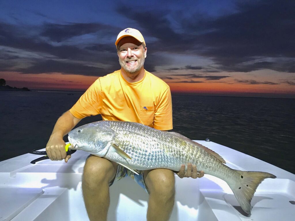 Dr. Collins with a fish